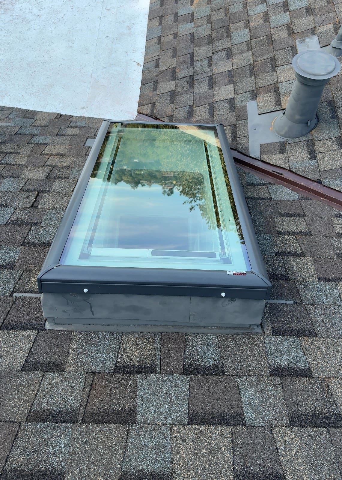 CertainTeed Landmark Pro Solaris in Max Def Weathered Wood — roof replacement & skylight installation, Belmont (photo 11)