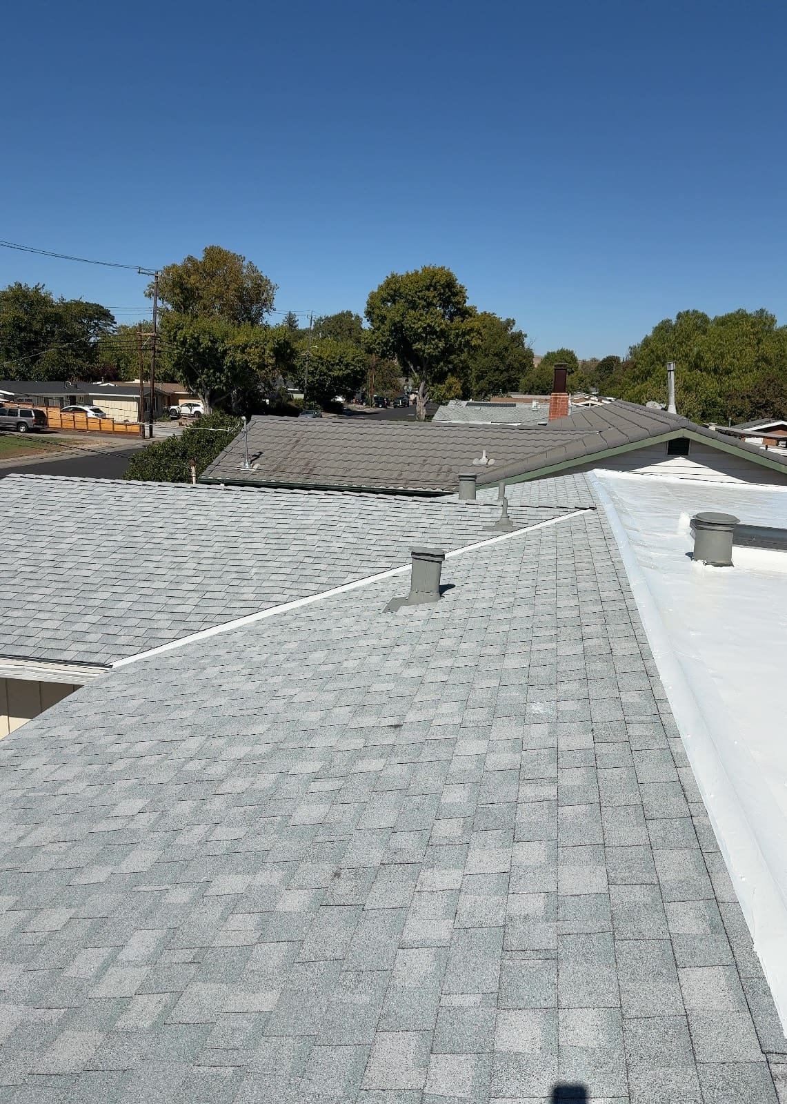 CertainTeed Landmark Solaris in Silver Birch — pitched & flat roof replacement, Concord